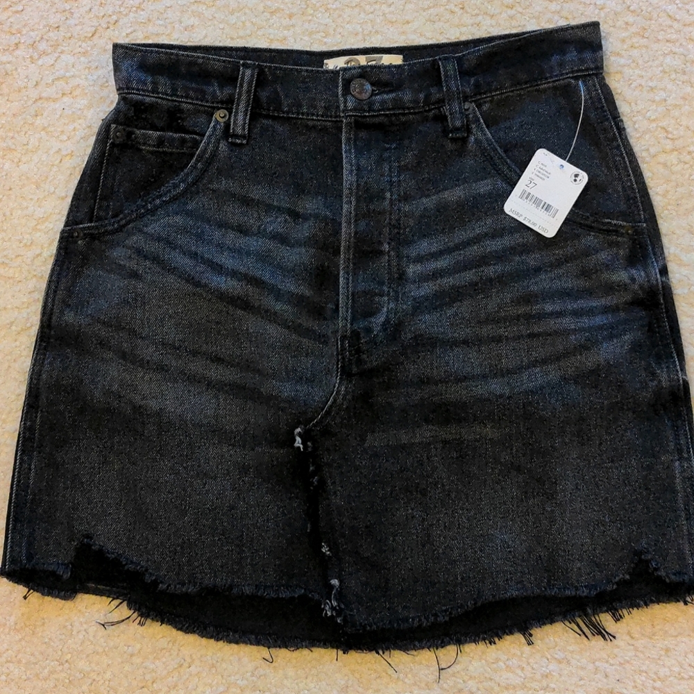 Free People We The Free faded black distressed denim button fly mini ski…